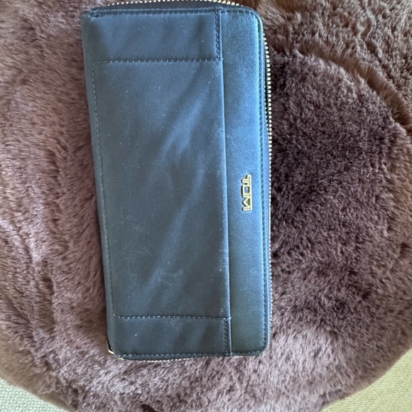 Tumi Black Zip Around Wallet with Gold Accent - Picture 5 of 6